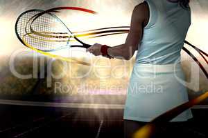 Composite image of athlete playing tennis with a racket