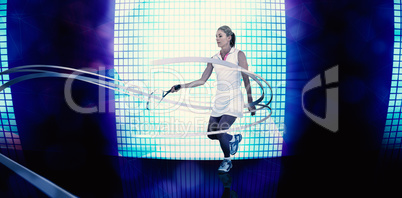 Composite image of athlete playing tennis with a racket