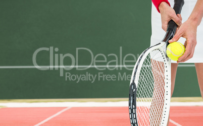 Composite image of athlete holding a tennis racquet ready to ser