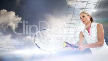 Composite image of athlete playing tennis with a racket