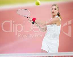 Composite image of athlete playing tennis with a racket