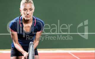 Composite image of tennis player playing tennis with a racket