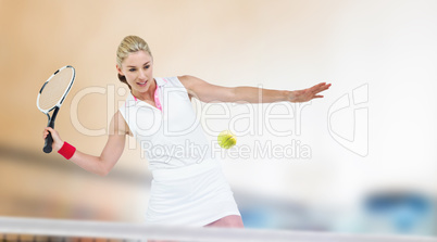 Composite image of athlete playing tennis with a racket