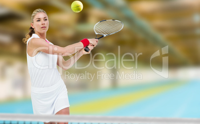 Composite image of athlete playing tennis with a racket