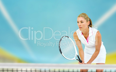 Composite image of athlete playing tennis with a racket