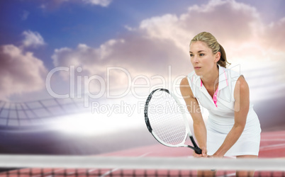 Composite image of athlete playing tennis with a racket