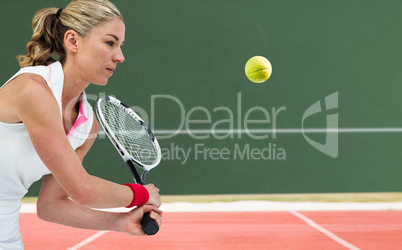 Composite image of athlete playing tennis with a racket