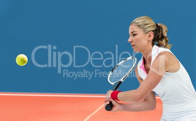 Composite image of athlete playing tennis with a racket