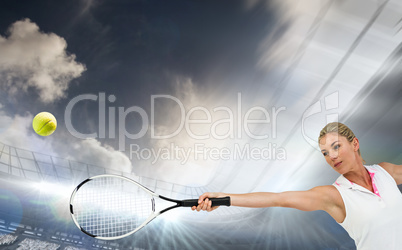 Composite image of athlete playing tennis with a racket