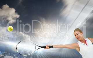 Composite image of athlete playing tennis with a racket