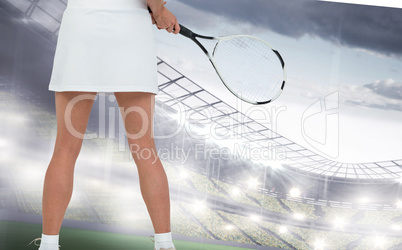 Composite image of athlete playing tennis with a racket