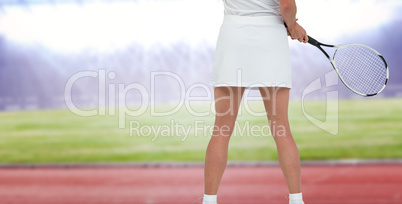 Composite image of athlete playing tennis with a racket