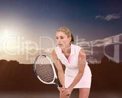 Composite image of athlete playing tennis with a racket