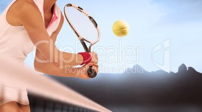 Composite image of athlete playing tennis with a racket