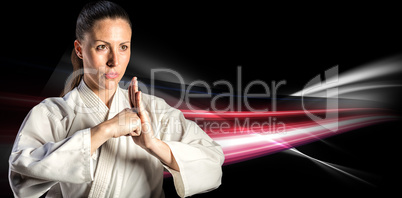 Composite image of female fighter performing hand salute