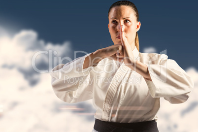 Composite image of female fighter performing hand salute