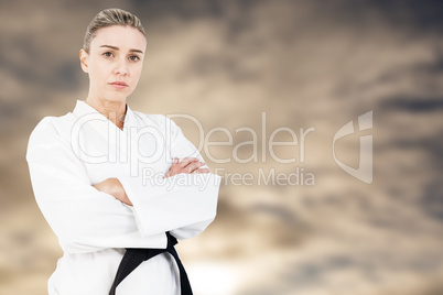 Composite image of female athlete posing in kimono