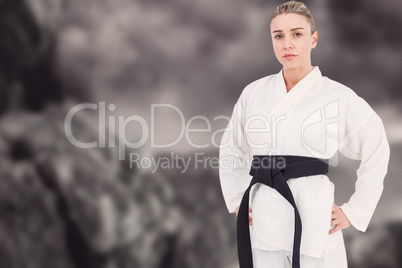Composite image of female athlete posing in kimono