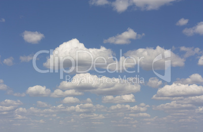 Blue sky with clouds background photo
