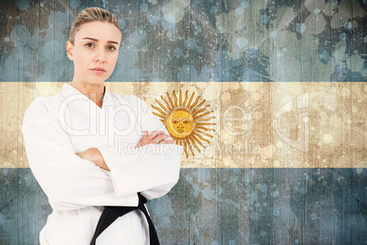 Composite image of female athlete posing in kimono