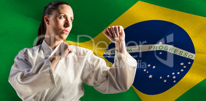 Composite image of female fighter performing karate stance