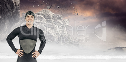 Composite image of portrait of confident swimmer in wetsuit