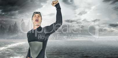 Composite image of swimmer posing after victory