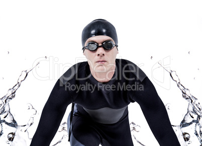 Composite image of confident swimmer in wetsuit