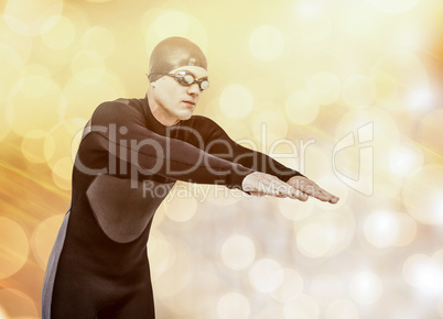 Composite image of swimmer in wetsuit while diving