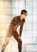 Composite image of swimmer in wetsuit and swimming goggles