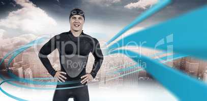 Composite image of portrait of confident swimmer in wetsuit