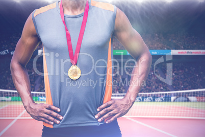 Composite image of portrait of sportsman chest with medals