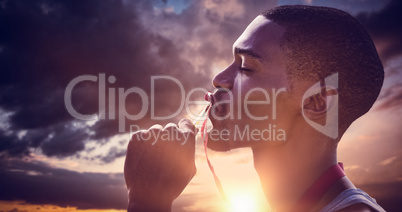 Composite image of profile portrait of sportsman is kissing his