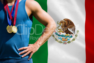 Composite image of portrait of sportsman chest with medals