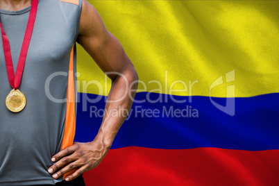 Composite image of portrait of sportsman chest with medals