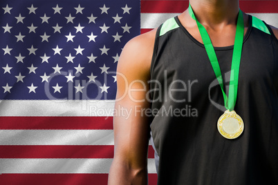 Composite image of portrait of sportsman chest with a medal