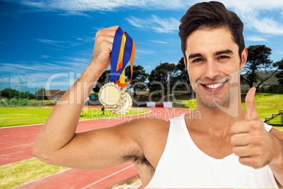 Composite image of athlete posing with gold medals