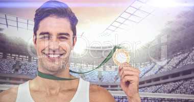 Composite image of athlete posing with gold medals around his ne