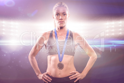 Composite image of athlete posing with gold medal around his nec