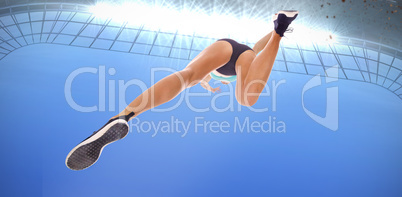 Composite image of low angle female athlete jumping