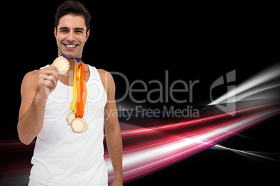 Composite image of athlete posing with gold medals around his ne