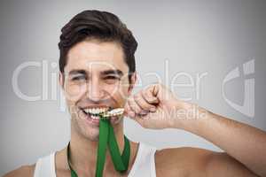 Composite image of athlete posing with gold medals