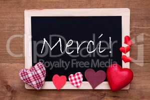 Blackboard With Textile Hearts, Text Merci Means Thank You