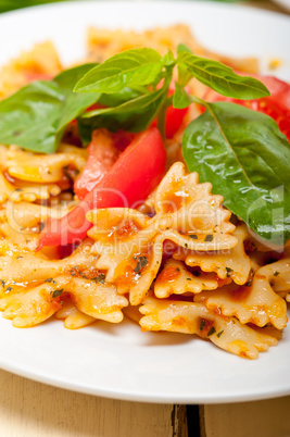 Italian pasta farfalle butterfly bow-tie and tomato sauce