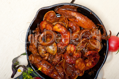 fresh seafoos stew on an iron skillet