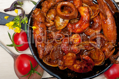 fresh seafoos stew on an iron skillet