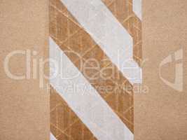 Packet parcel with striped tape