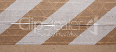 Packet parcel with striped tape