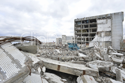 Pieces of Metal and Stone are Crumbling from Demolished Building Floors