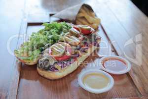 Open faced juicy Steak meaty sandwich filled with vegetables